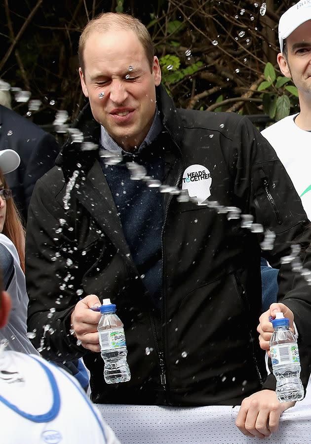 Prince William copped the most of the water in his face, while the Duchess was splashed with droplets to her fleece. Photo: Getty