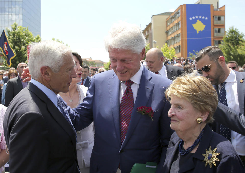 Former U.S. President Bill Clinton, center, speaks with ex-Secretary of State Madeleine Albright, right, and then-NATO commander Wesley Clark during anniversary celebrations in the capital Pristina, Kosovo, Wednesday, June 12, 2019. It’s exactly 20 years since NATO forces set foot in the former Yugoslav province, after an allied bombing campaign ended Serbia’s bloody crackdown on an insurrection by the majority ethnic Albanian population in Kosovo _ revered by Serbs as their historic and religious heartland. (AP Photo/Visar Kryeziu)