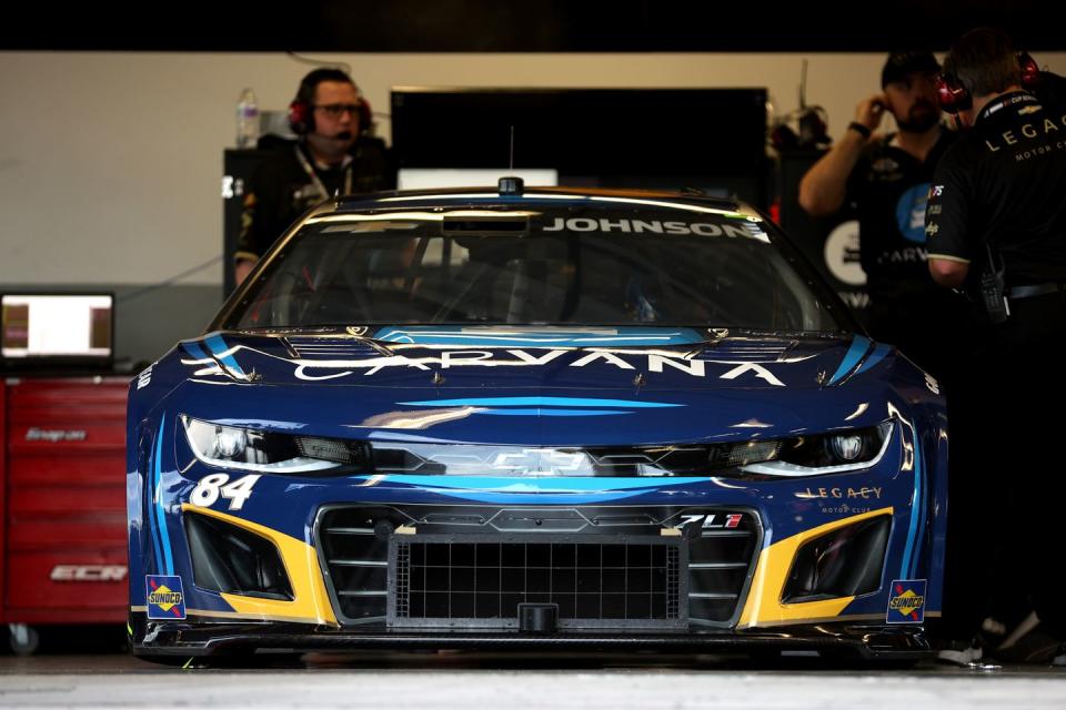 daytona beach, florida february 17 crew members prepare the 84 carvana chevrolet, driven by jimmie johnson in the garage area during practice for the nascar cup series 65th annual daytona 500 at daytona international speedway on february 17, 2023 in daytona beach, florida photo by james gilbertgetty images