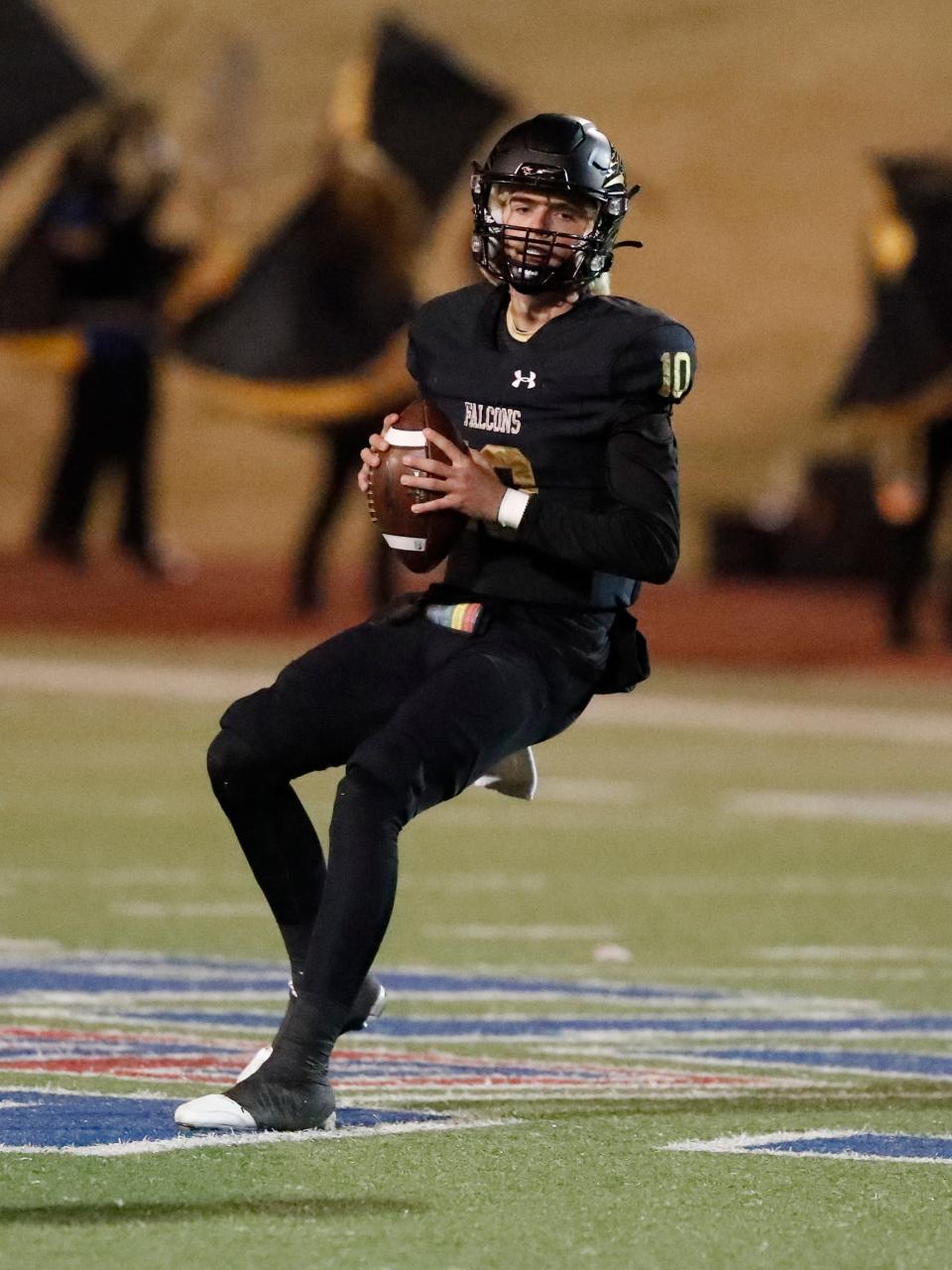 Bushland’s Dawson Jaco looks for an open receiver in the first half. Bushland faces Jim Ned in a football playoff game, Friday, Nov. 18, 2022, at Lowrey Field PlainsCapital Park. 