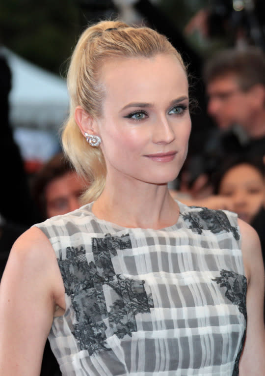 Lesson: Never underestimate the power of a cat eye and a simple ponytail. Kruger showed how powerful this simple, girly pairing is at the Cannes Film Festival in 2012.