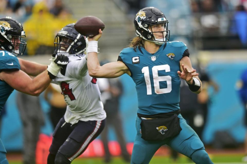 Jacksonville Jaguars quarterback Trevor Lawrence (16) looks to pass during the fourth quarter Sunday, Dec. 2021 at TIAA Bank Field in Jacksonville. The Jaguars hosted the Texans during a regular season NFL game. Houston defeated Jacksonville 30-16. [Corey Perrine/Florida Times-Union]