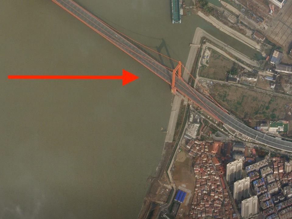 A satellite image shows traffic on the Yingwuzhou Yangtze River Bridge in Wuhan, China, January 12, 2020, before the city is put under virtual lockdown due to the outbreak of the new coronavirus.