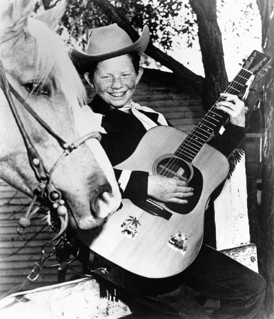 Jimmy Boyd holding a guitar