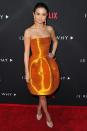 <p>It's official - Selena Gomez just brought the puffball skirt back. Wearing a orange metallic Oscar De La Renta dress with matching ombre orange earrings, orange eyshadow and the cutest mules we've ever seen, the singer looked epic at the 13 Reasons premiere in March 2017.</p>
