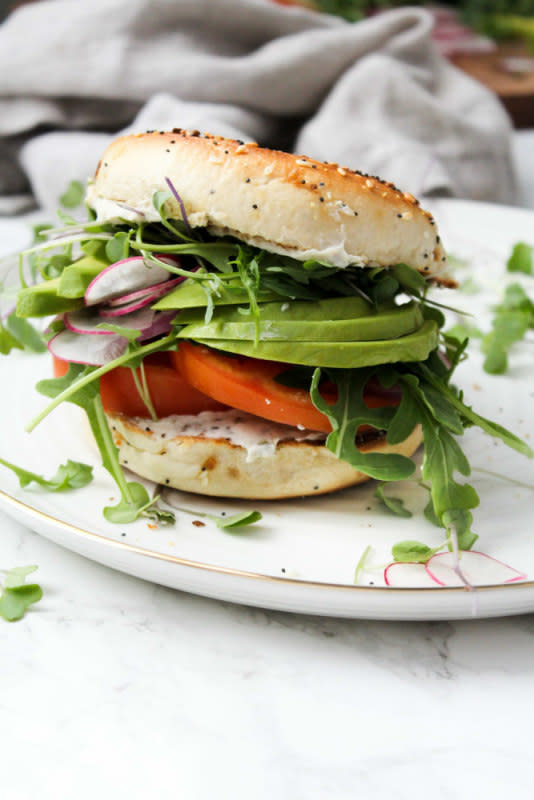 <p>ThisSavoryVegan.com</p><p>A toasted bagel is loaded up with vegan cream cheese, avocado and a whole lotta veggies.</p><p><strong>Get the recipe: <a href="https://www.thissavoryvegan.com/the-best-veggie-everything-bagel-sandwich/" rel="nofollow noopener" target="_blank" data-ylk="slk:The Best Veggie Everything Bagel Sandwich;elm:context_link;itc:0;sec:content-canvas" class="link ">The Best Veggie Everything Bagel Sandwich</a></strong></p>