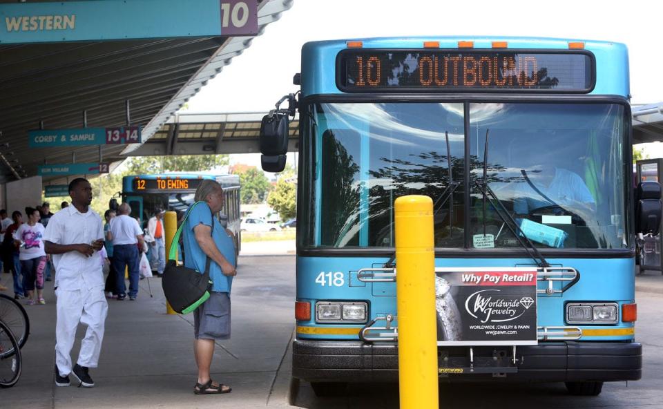 Buses arrive and depart from the Transpo South Street Station in South Bend last year.