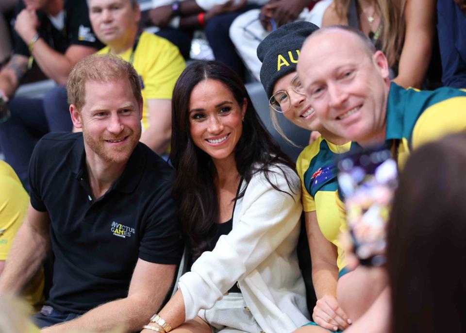 <p>Chris Jackson/Getty</p> Prince Harry and Meghan Markle at the Invictus Games in Düsseldorf, Germany