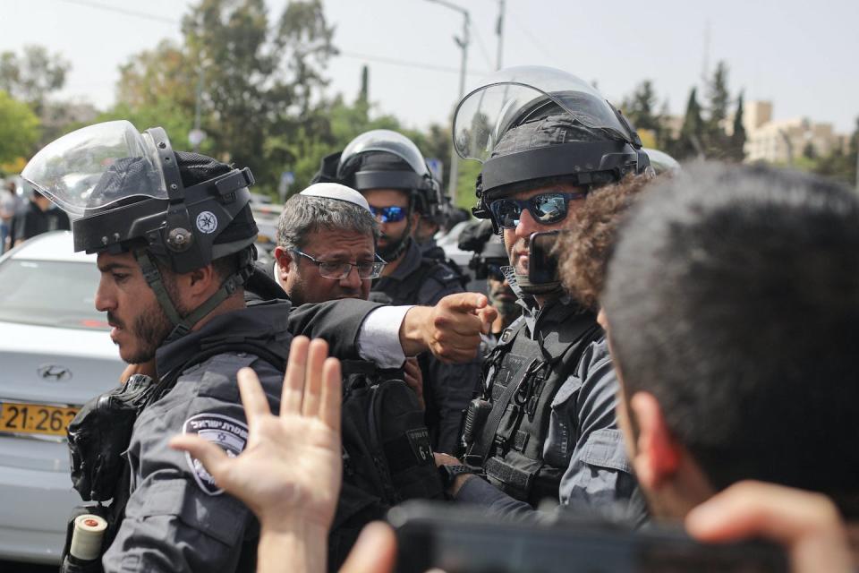 In the Palestinian-dominated Sheikh Jarrah neighborhood of Jerusalem, Itamar Ben-Gvir, center, with arm extended, argues with demonstrators objecting to forced evictions of Palestinian residents. <a href="https://www.gettyimages.com/detail/news-photo/may-2021-israel-jerusalem-right-wing-knesset-member-itamar-news-photo/1232806654" rel="nofollow noopener" target="_blank" data-ylk="slk:Ilia Yefimovich/picture alliance via Getty Images;elm:context_link;itc:0;sec:content-canvas" class="link ">Ilia Yefimovich/picture alliance via Getty Images</a>