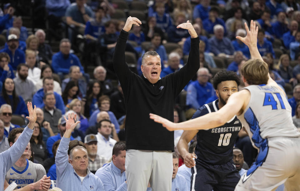 Creighton head coach Greg McDermott yells to his team as they play against Georgetown during the first half of an NCAA college basketball game, Tuesday, Feb. 13, 2024, in Omaha, Neb. (AP Photo/Rebecca S. Gratz)