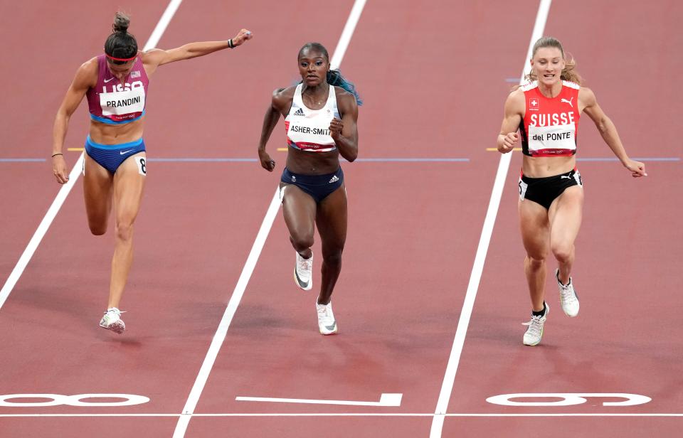 Great Britain’s Dina Asher-Smith (centre) struggles during the women’s 100 metres semi-finals. (PA Wire)