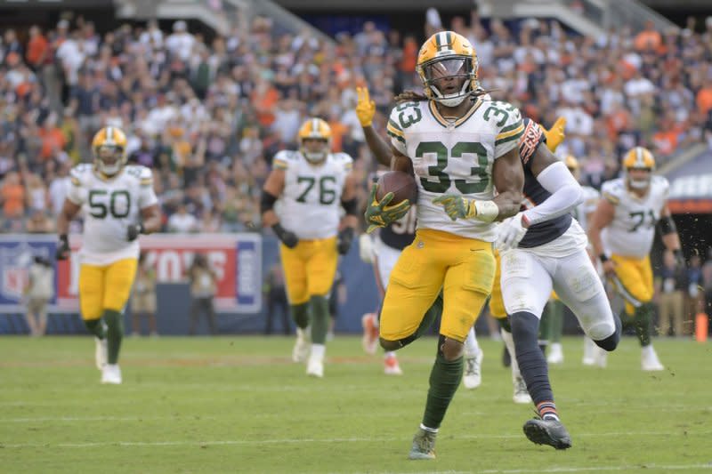 Green Bay Packers running back Aaron Jones (33) runs for a touchdown against the Chicago Bears on Sunday at Soldier Field in Chicago. Photo by Mark Black/UPI