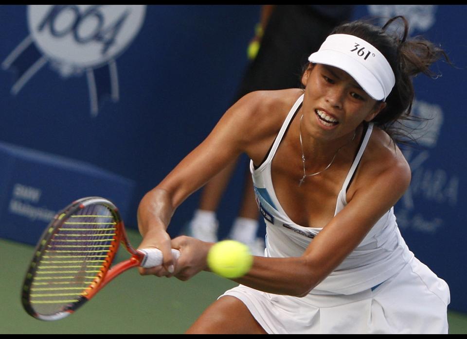 Hsieh Su-wei of Taiwan returns a shot against Petra Martic of Croatia during their final match at the WTA Malaysian Open tennis tournament in Kuala Lumpur, Malaysia, Sunday, March 4, 2012. Hsieh won the match after Martic was injured and retired. 