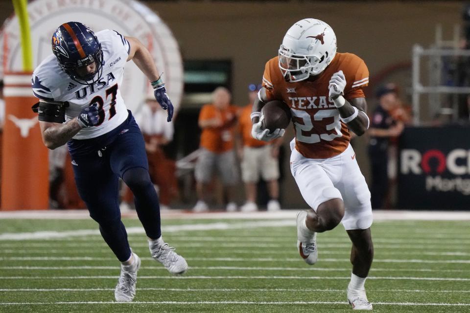 Texas' Jahdae Barron returns an interception 44 yards for a pick-six touchdown in the Longhorns' 38-20 win over UTSA. Barron and D'Shawn Jamison are tied for the team lead with two interceptions each this season.