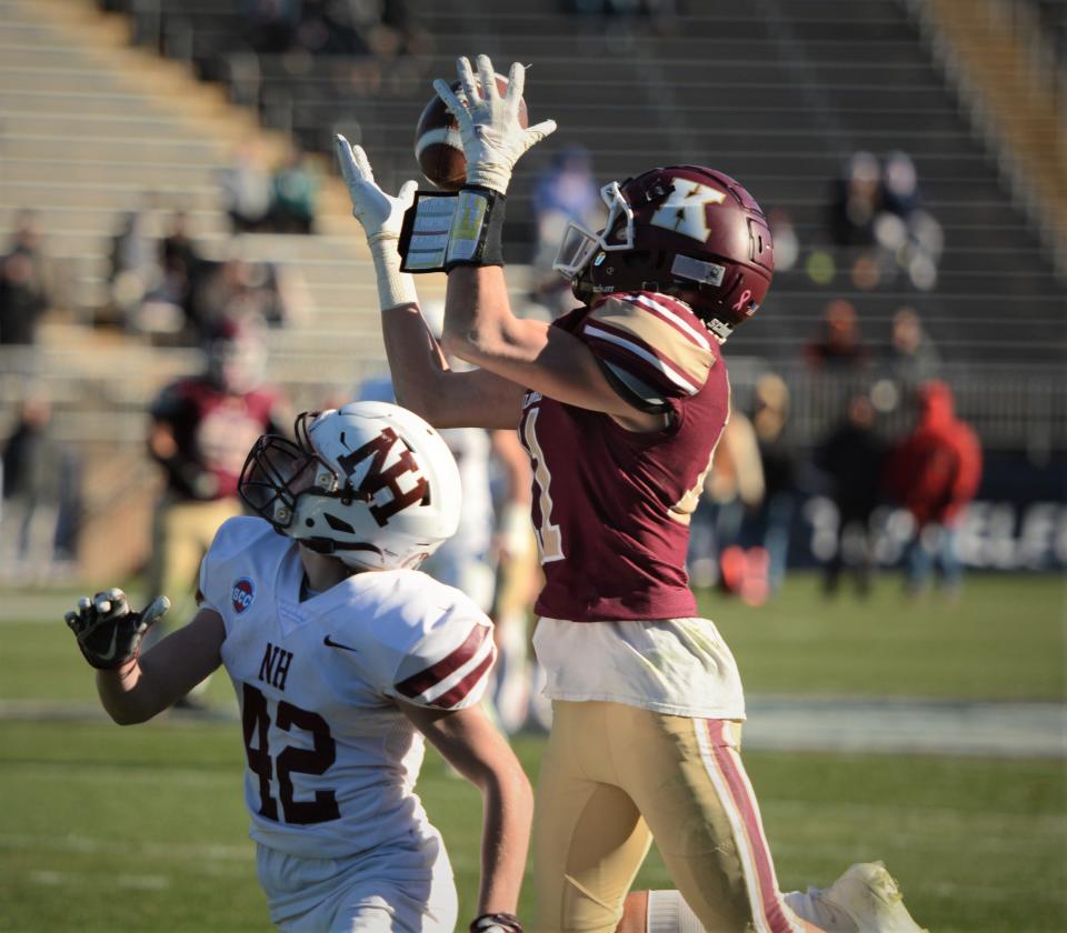 Killingly senior Noah Colangelo makes the catch against North Haven's Joey Mastroianni during the Class MM championship game Saturday at Rentschler Field in East Hartford.
