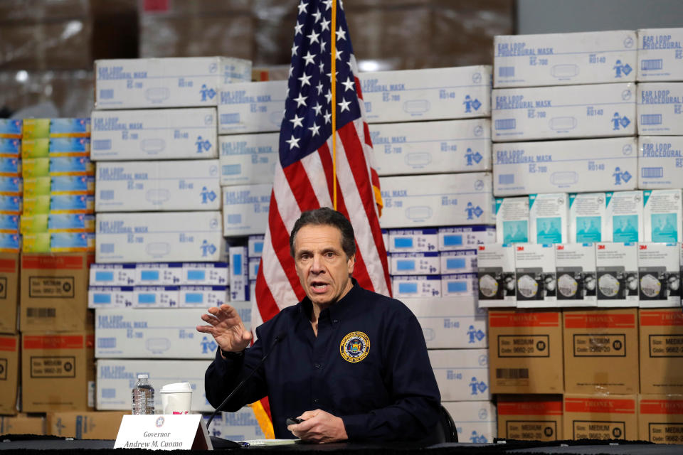 New York Governor Andrew Cuomo speaks in front of stacks of medical protective supplies during a news conference at the Jacob K. Javits Convention Center, which will be partially converted into a temporary hospital during the outbreak of the coronavirus disease (COVID-19) in New York City, New York, U.S., March 24, 2020. (Mike Segar/Reuters)