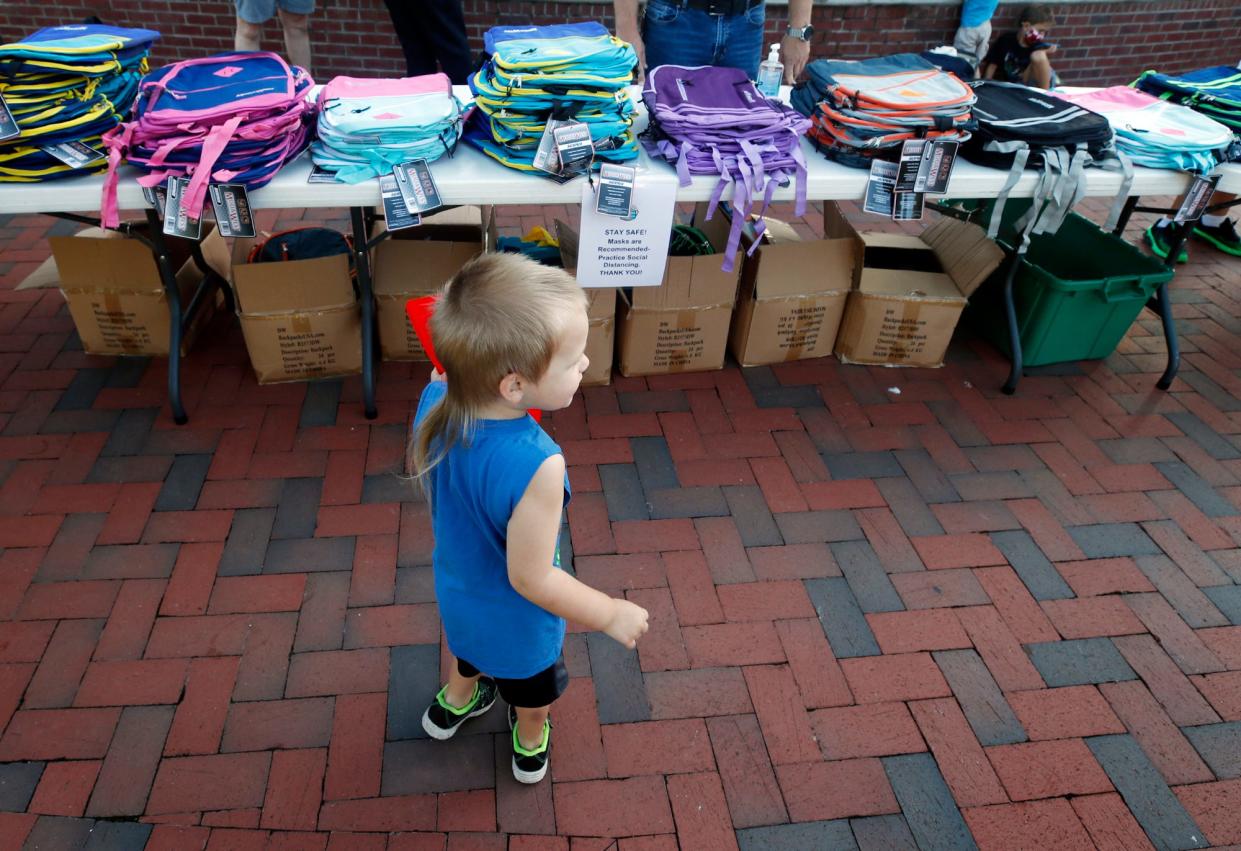 Children can pick up free school supplies Saturday morning in DeLand at the annual Mayor's Backpack Giveaway at Earl Brown Park. A child is pictured here at the event in 2021.