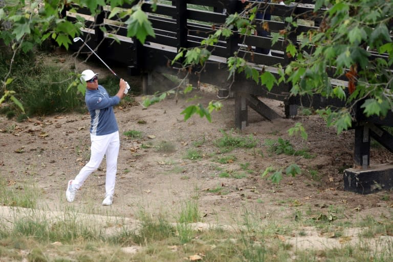 American Rickie Fowler plays his second shot on the eighth hole on the way to an eight-under par 62 in the first round of the US Open at Los Angeles Country Club (EZRA SHAW)