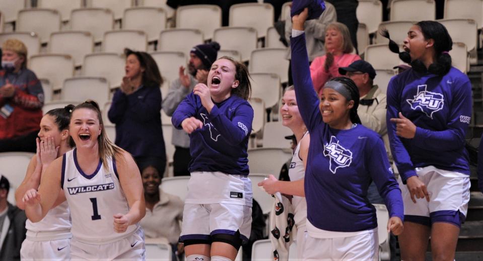 The ACU bench celebrates after Bella Earle's basket pulls the Wildcats within one (71-70) with 1:59 left in the game against New Mexico State.