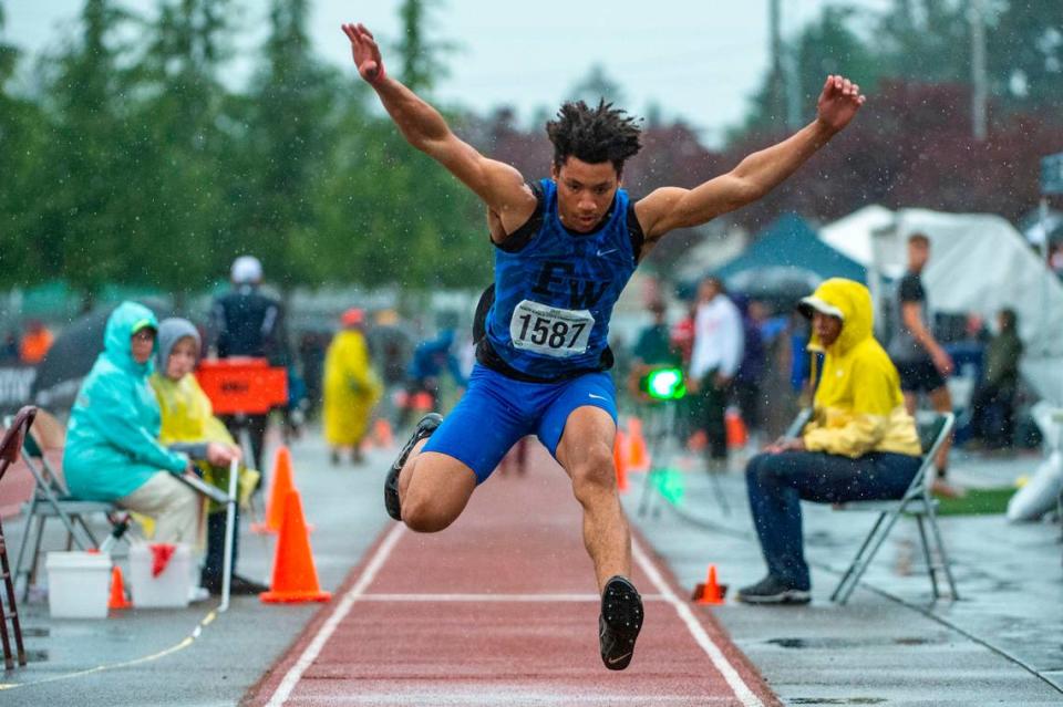 Federal Way’s Jaylon Jenkins leaps toward the pit during an attempt in the 4A boys triple jump at the State 2A, 3A, 4A track and field championships on Thursday, May 26, 2022, at Mount Tahoma High School in Tacoma Wash.