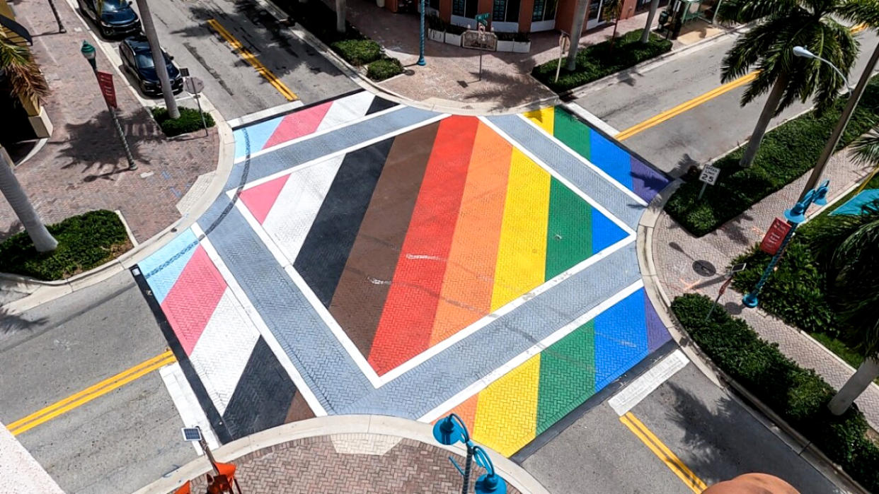 Tire marks are seen across the Pride flag intersection in Delray Beach.