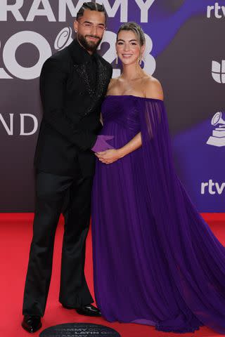 <p>Neilson Barnard/Getty</p> Maluma, in custom AMIRI, and Susana Gomez at the 2023 Latin Grammy Awards on Nov. 16 in Seville, Spain