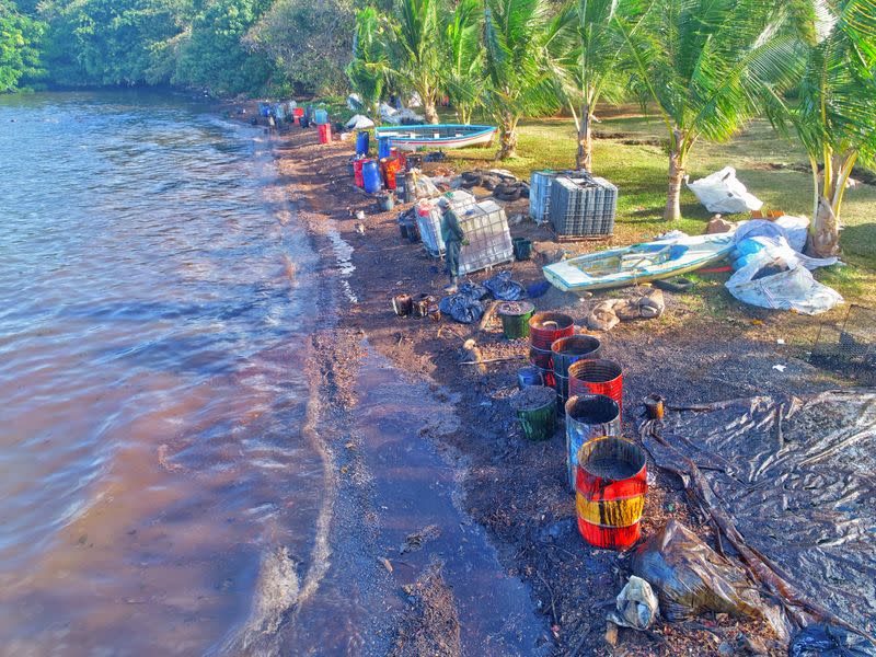 A drone image shows materials prepared by volunteers to handle leaked oil from the bulk carrier ship MV Wakashio, which ran aground on a reef, at the Riviere des Creoles