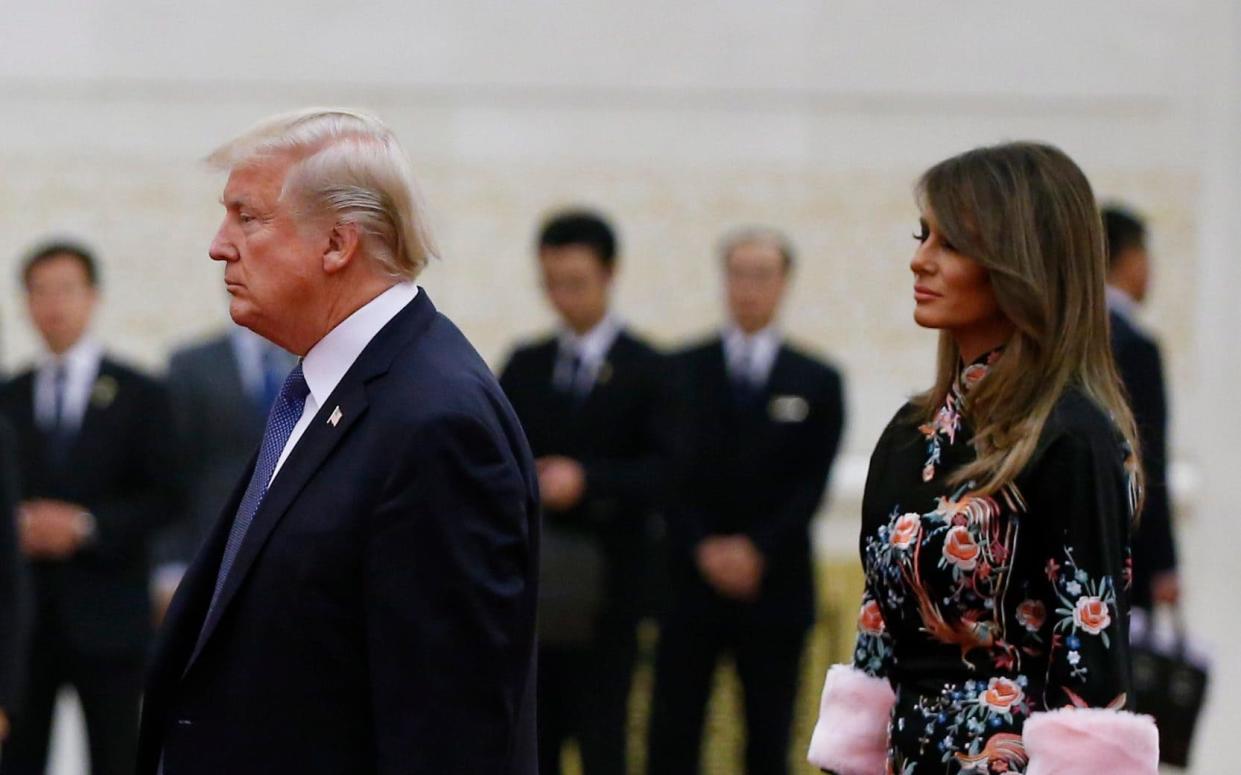 Donald Trump and first lady Melania were treated to a state dinner at the Great Hall of the People in Beijing, China, last November - REUTERS POOL