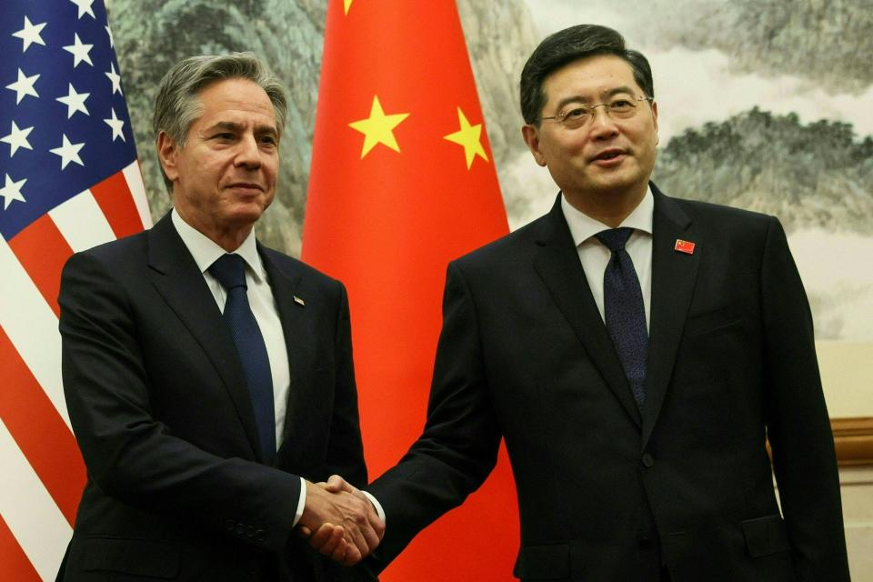 Former Chinese Foreign Minister Qin Gang shakes hands with US State Secretary Antony Blinken in June 2023.