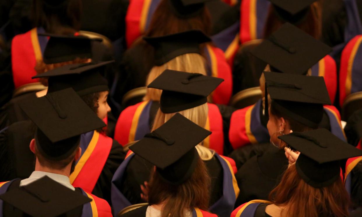 <span>Caps at a graduation ceremony. </span><span>Photograph: Chris Radburn/PA</span>