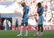 Britain Football Soccer - Arsenal v Manchester City - FA Cup Semi Final - Wembley Stadium - 23/4/17 Manchester City's Fabian Delph and Raheem Sterling look dejected after the match Reuters / Darren Staples Livepic