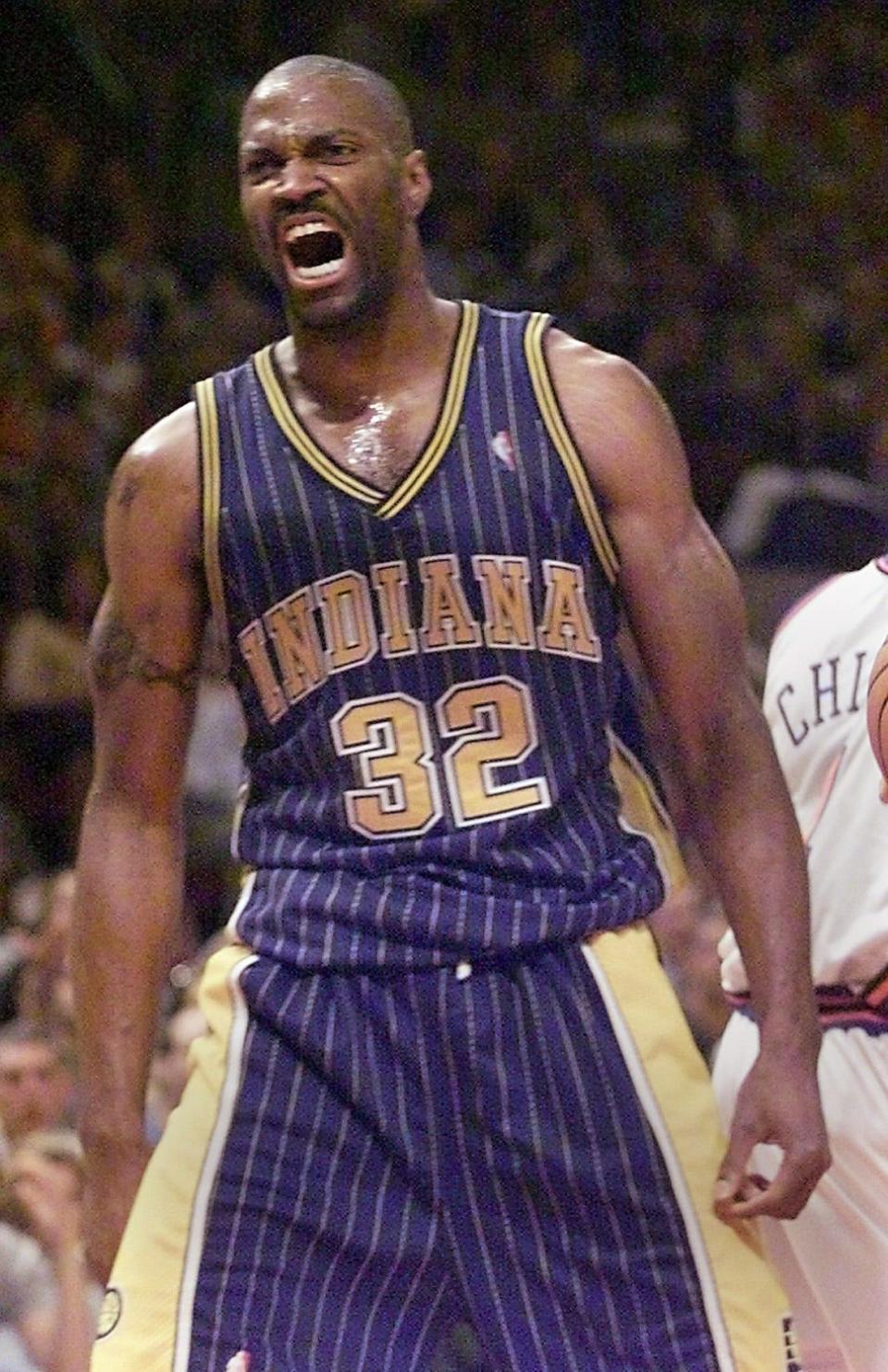 Dale Davis shows his emotions after a monster dunk during second quarter action in Game 6 against the New York Knicks at Madison Square Garden.