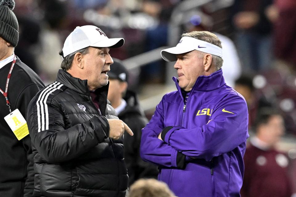 Nov 26, 2022; College Station, Texas, USA;  LSU Tigers head coach Brian Kelly and Texas A&amp;M Aggies head coach Jimbo Fisher talk prior to a game at Kyle Field. Mandatory Credit: Maria Lysaker-USA TODAY Sports