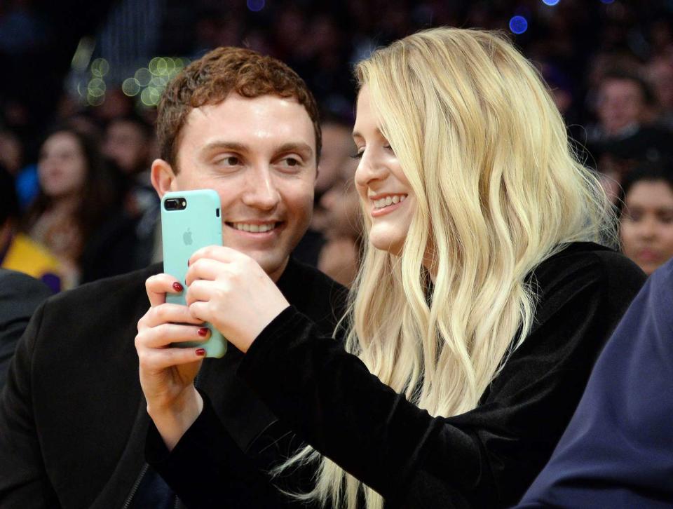 Daryl Sabara (L) and Meghan Trainor attend a basketball game between Los Angeles Clippers and Los Angeles Lakers at Staples Center March 21 2017, in Los Angeles, California