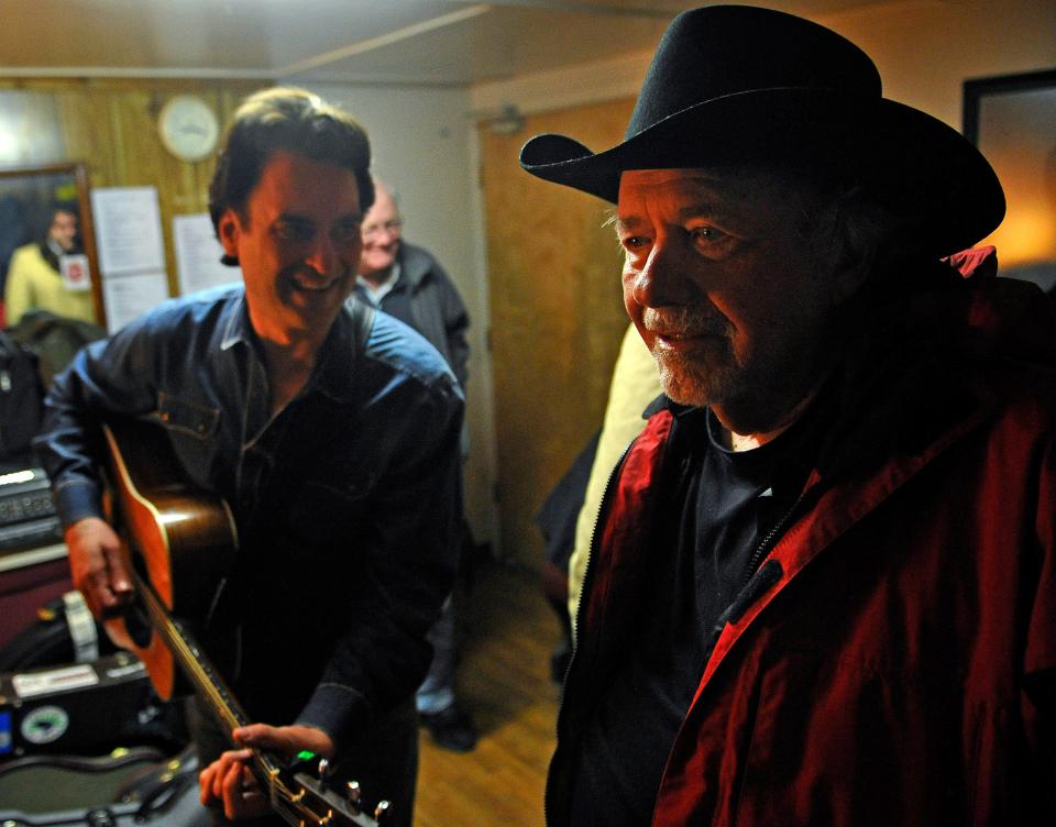 Peter Cooper and Bobby Bare share a laugh backstage at the Paul Craft Tribute Concert at the Station Inn Wednesday Feb. 4, 2015, in Nashville, TN