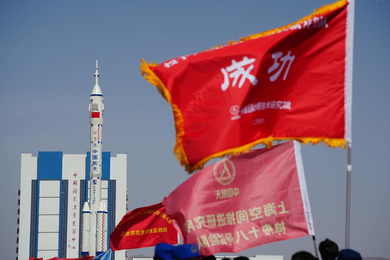 The combination of the Shenzhou-18 crewed spaceship and a Long March-2F carrier rocket is transferred to the launching area at the Jiuquan Satellite Launch Center on April 17, 2024 in Alxa League, Inner Mongolia Autonomous Region of China.