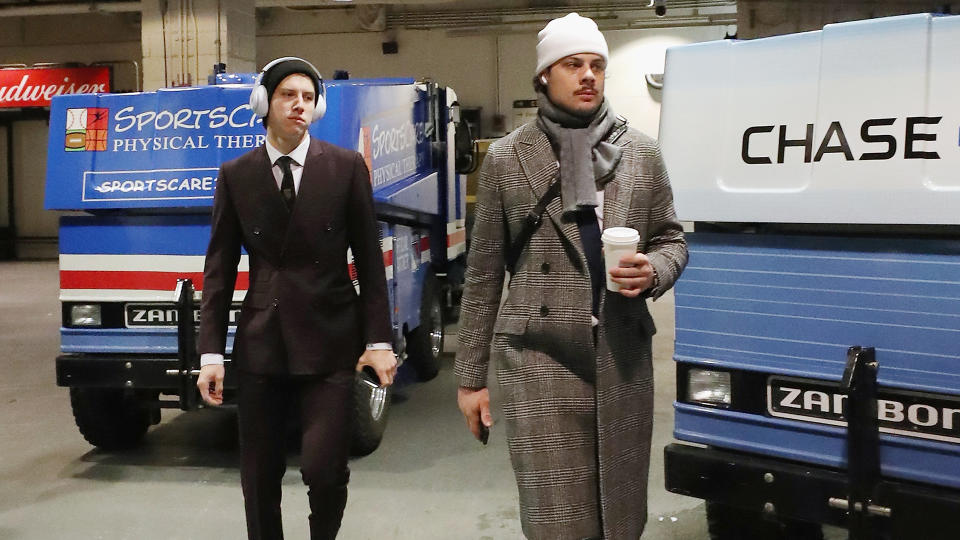 Toronto Maple Leafs stars Mitch Marner, left, and Auston Matthews, right, arrive for a game. (Photo by Bruce Bennett/Getty Images)