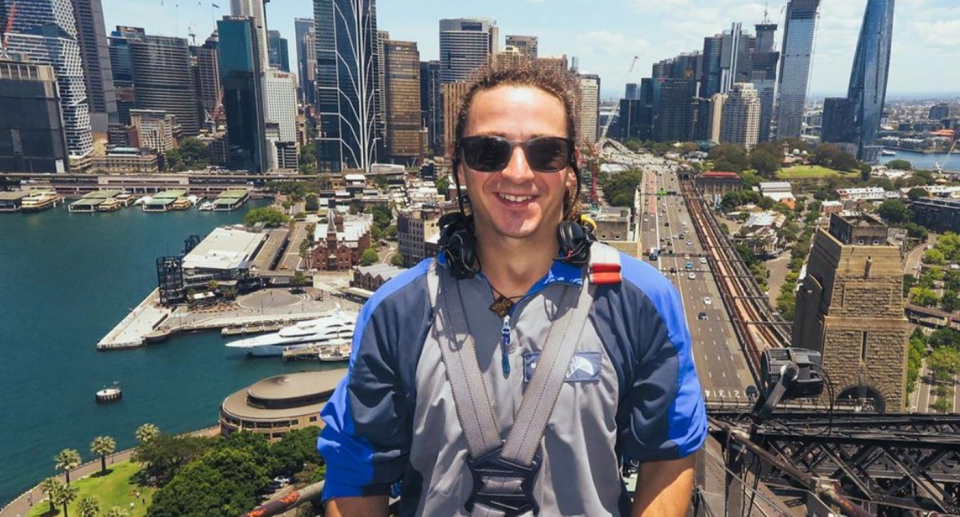 Canadian national Ambrose Walton atop the Sydney Harbour Bridge.