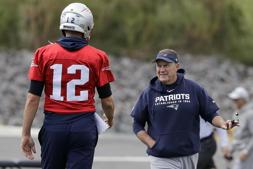 FILE - New England Patriots quarterback Tom Brady (12) and head coach Bill Belichick, right, speak during an NFL football practice, Wednesday, Sept. 18, 2019, in Foxborough, Mass. Six-time NFL champion Bill Belichick has agreed to part ways as the coach of the New England Patriots on Thursday, Jan. 11, 2024, bringing an end to his 24-year tenure as the architect of the most decorated dynasty of the league’s Super Bowl era, a person with knowledge of the situation told The Associated Press on the condition of anonymity because it has not yet been announced.(AP Photo/Steven Senne, File)