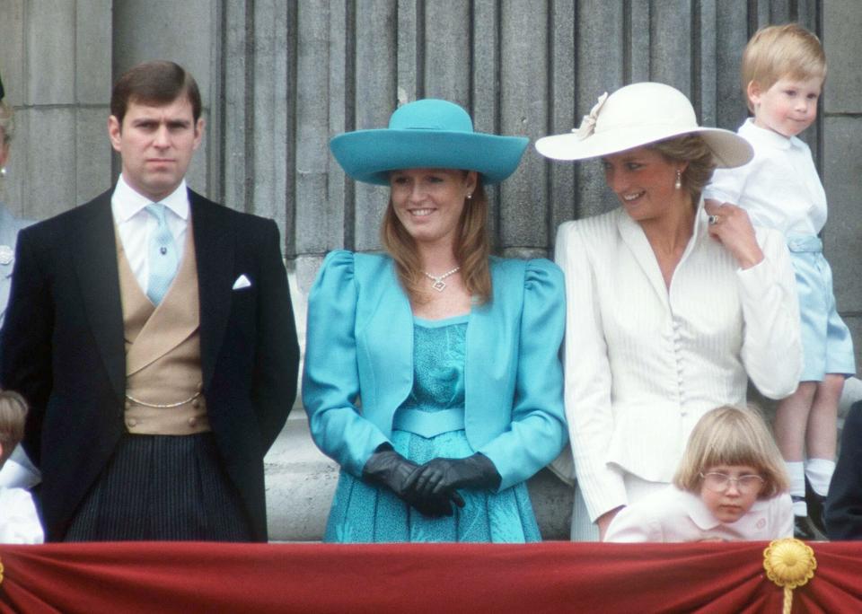Prince Andrew, Sarah Duchess Of York, Princess Diana And Prince Harry On The Balcony Of Buckingham Palace For Trooping The Colour. She is wearing a hat by Philip Somerville