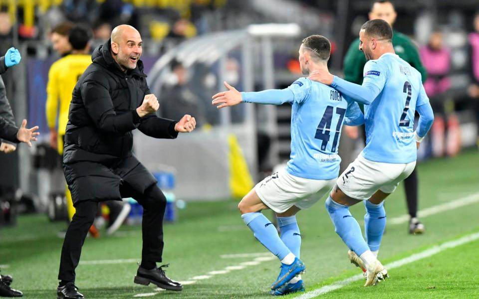 Pep Guardiola's Manchester City are still on course for an historic quadruple this season after beating Borussia Dortmund in the Champions League quarter-finals - Martin Meissner /AP POOL 