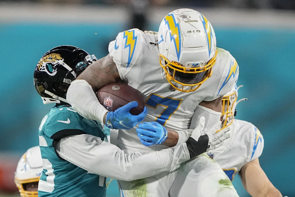 Los Angeles Chargers tight end Gerald Everett (7) runs against the Jacksonville Jaguars during the second half of an NFL wild-card football game, Saturday, Jan. 14, 2023, in Jacksonville, Fla. (AP Photo/Chris Carlson)