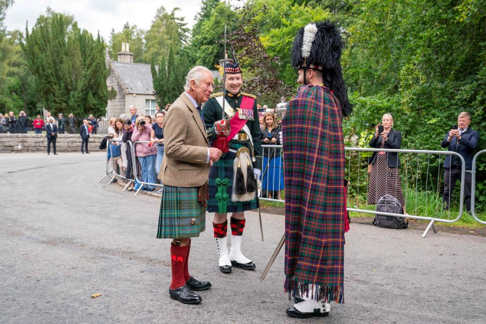 King Charles, left, arrives to inspect Balaklava Company, 5th Battalion The Royal Regiment of Scotland, at the gates of Balmoral Castle.