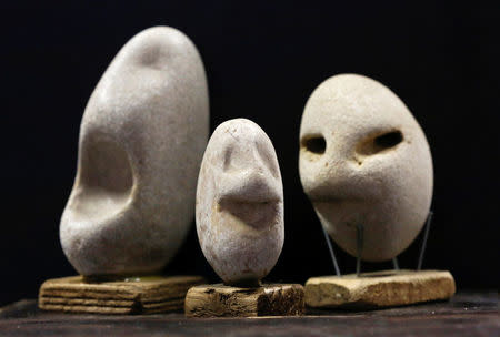 Stones collected and categorised by shape (faces) are seen at the home workshop of stone collector Luigi Lineri in Zevio, near Verona, Italy, June 10, 2016. REUTERS/Alessandro Bianchi