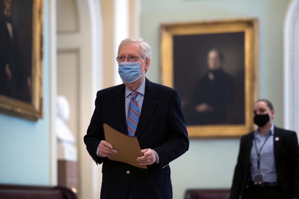 Senate Minority Leader Mitch McConnell, R-Ky., arrives at the Capitol in Washington on Friday.