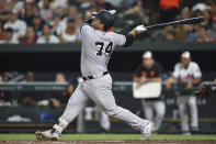 New York Yankees' Mike Ford follows through on a solo home run against the Baltimore Orioles in the eighth inning of a baseball game, Monday, Aug. 5, 2019, in Baltimore. (AP Photo/Gail Burton)