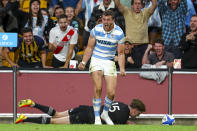 Argentina's Emiliano Boffelli celebrates after scoring a try during the Rugby Championship test match between the All Blacks and the Pumas in Brisbane, Australia, Saturday, Sept. 18, 2021. (AP Photo/Tertius Pickard)