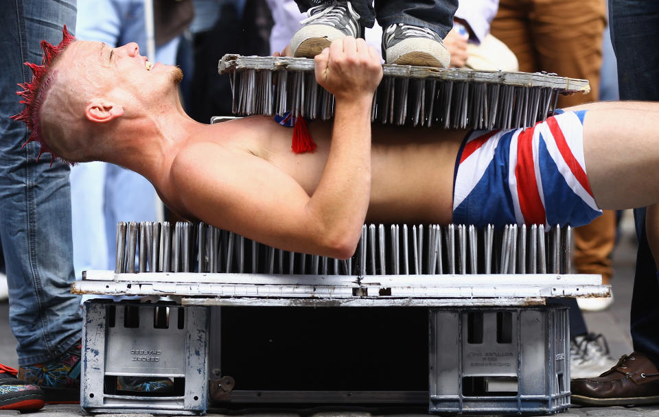 Fringe Performers Take To Edinburgh's Royal Mile