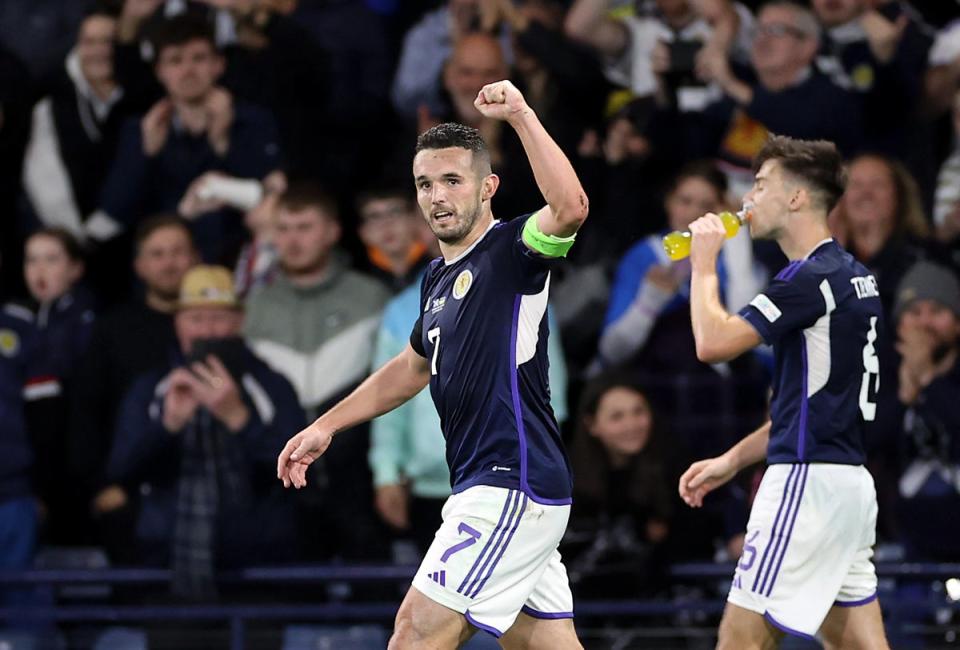 John McGinn celebrates after scoring against Ukraine (PA Wire)