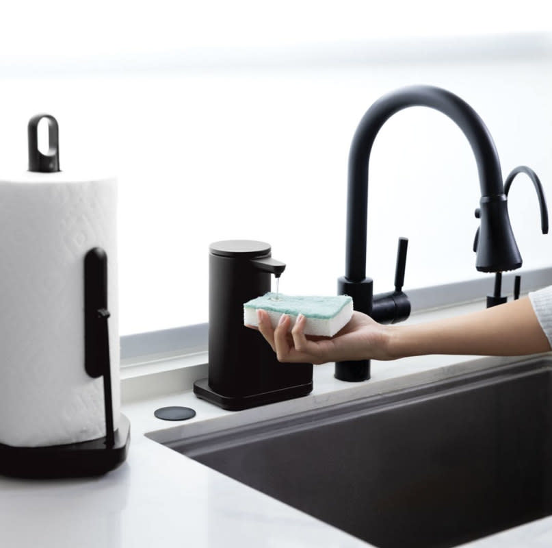 Choose a soap dispenser that has built-in sponge storage.<p>SimpleHuman</p>